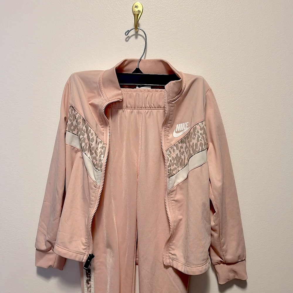 Nike kids track suit - pink with cheetah print detail. So cute. Size 6-7